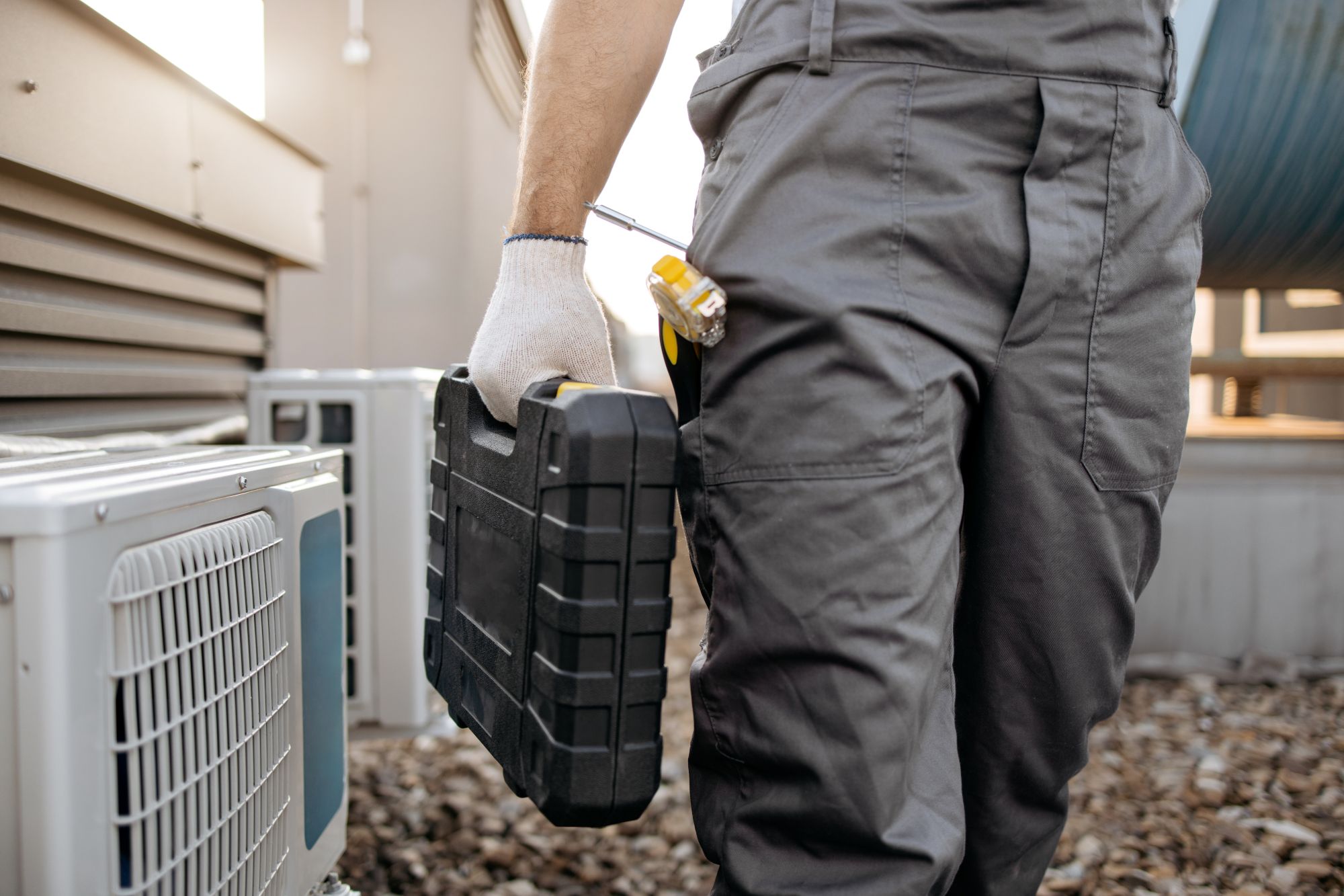 Universal Air technician providing HVAC service in Milan, NM